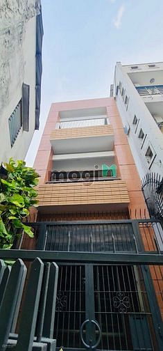 Cho thuê nhà nở hậu 9m, 91A Đặng Dung Tân Định, Quận 1