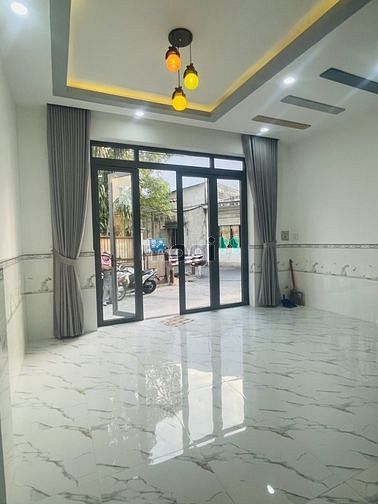 nhà mới 2 tầng hẻm xe hơi thông ngang 5m Tân chánh hiệp q12 nhỉnh 3 ty