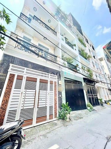 Bán nhà 1 trệt, 3 lầu, Dương Đức Hiền đường lớn xe hơi vô tận cửa