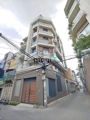 Bán nhà 20 tỷ HXH Góc 2 MT Lê Văn Sỹ - Q.TB; DT 5.6 x 16m - Hầm 6 Tầng