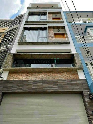 bán nhà MT NB  Bàu Cát, P14 quận tân bình (5x20) 4L giá 15 tỷ