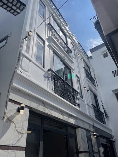 Nhỉnh nhẹ 6 tỷ đã có nhà mới ngay Huỳnh Văn Bánh 140m2 4 tầng gần chợ