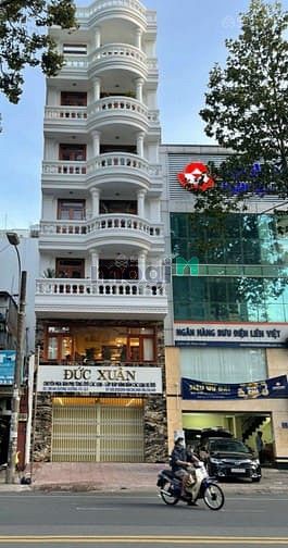 Tòa nhà thương mại đường Tân Sơn Nhì, Tân Phú. DT 17x35. Hầm 7 tầng