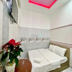 Bán KS 6 lầu MT Hà Huy Giáp 210 (6.5x30) 32PN DT 100tr gần cầu P.Long