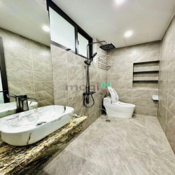 Bán nhà Vũ Tông Phan - 48m x 6 tầng Thang máy - ô tô đỗ cửa - nở hậu