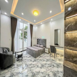 Nhà 2 lầu và sân thượng tuyệt đẹp đường D13 KDC Hồng Loan