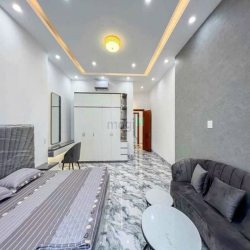 Nhà 2 lầu và sân thượng tuyệt đẹp đường D13 KDC Hồng Loan