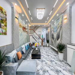 Nhà 2 lầu và sân thượng tuyệt đẹp đường D13 KDC Hồng Loan
