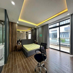 Nhà Phố Hiện Đại - Mặt tiền hẻm xe hơi 6m dt 5,6m x 15m Giá 7,39 tỷ