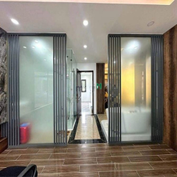 Nhà Phố Hiện Đại - Mặt tiền hẻm xe hơi 6m dt 5,6m x 15m Giá 7,39 tỷ