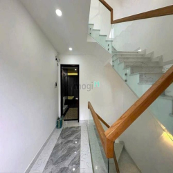 Nhà Phố Hiện Đại - Mặt tiền hẻm xe hơi 6m dt 5,6m x 15m Giá 7,39 tỷ