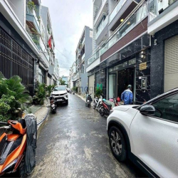 Nhà Phố Hiện Đại - Mặt tiền hẻm xe hơi 6m dt 5,6m x 15m Giá 7,39 tỷ