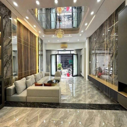 Nhà Phố Hiện Đại - Mặt tiền hẻm xe hơi 6m dt 5,6m x 15m Giá 7,39 tỷ