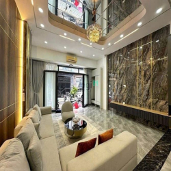 Nhà Phố Hiện Đại - Mặt tiền hẻm xe hơi 6m dt 5,6m x 15m Giá 7,39 tỷ